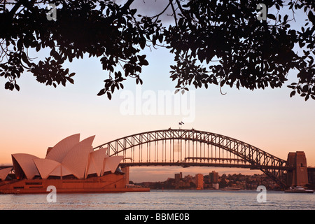 Australia New South Wales. Sydney Opera House and Harbour Bridge at sunrise. Stock Photo