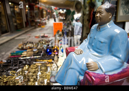 China, Hong Kong.  Chinese Chariman Mao souvenirs for sale in Hong Kong street market Stock Photo
