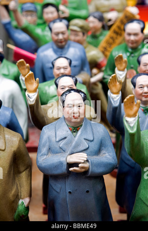 China, Hong Kong.  Chinese Chariman Mao souvenirs for sale in Hong Kong street market Stock Photo