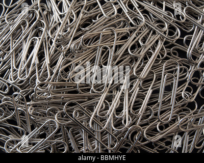 Close up of lots of silver paper clips Stock Photo