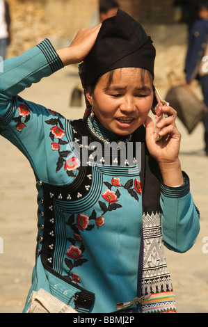 Hani woman on her cell phone in Yuanyang China Stock Photo