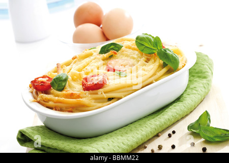 Pasta bake, macaroni-casserole and chicken eggs Stock Photo