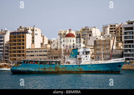 The rusting hulk of the ferry Atlantic Ocean. Destined to become an artificial reef. Sliema, Malta. Stock Photo