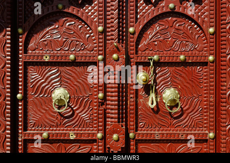 Historic carved wooden door in Sur, Sharqiya Region, Sultanate of Oman, Arabia, Middle East Stock Photo