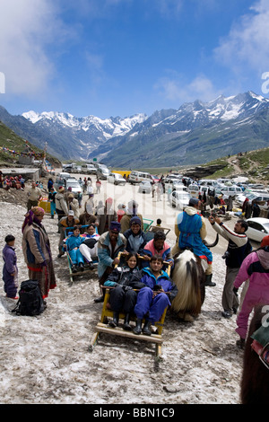 Indian tourists having fun on the snow. Rohtang Pass.Manali-Leh road.Himachal Pradesh.India Stock Photo