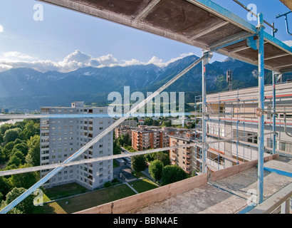 Scaffolding, fixation rod, scaffolding on a building, high-rise building, Olympic village, Innsbruck, Austria, Europe Stock Photo