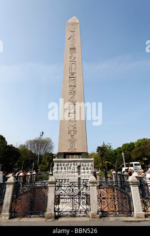 Egyptian obelisk with relief at the base, ancient Byzantine Hippodrome, Sultanahmet, Istanbul, Turkey Stock Photo