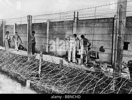 Nazism / National Socialism, crimes, concentration camps, Dachau, constreuction of the outer wall, prisoners at work, August 1933, Stock Photo