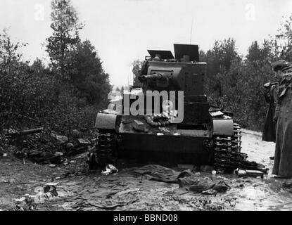 events, Second World War / WWII, Finland, knocked out Soviet light tank T-26, probably 1941, tanks, 20th century, destroyed, soldiers, USSR, Soviet Union, Russia, destruction, wreck, scattered equipment, T 26, T26, historic, historical, people, 1940s, Stock Photo