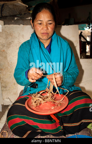 Women Workers stripping  fibers at Jungshi Handmade Paper Factory in Thimphu Bhutan, Asia 91025 Bhutan-Thimphu Stock Photo