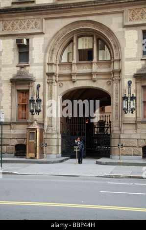 Doorman outside main entrance to the Dakota Building (West 72nd St elevation), New York, where John Lennon was murdered in 1980.