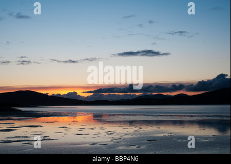 Sunset over Luskentyre estuary and Taransay, Isle of Harris, Outer Hebrides, Scotland, Stock Photo