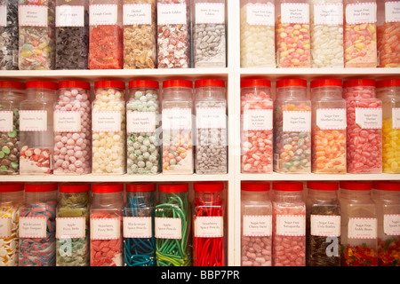 Jars of sweets on display in a shop Stock Photo