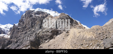Hanging glaciers on steep rocky mountain Cuyoc Cordillera Huayhuash Andes Peru South America Stock Photo