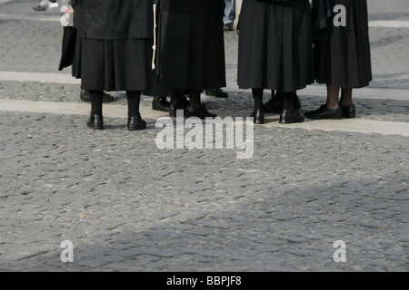 nuns  in saint peter's square in rome Stock Photo