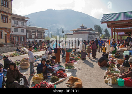 Market traders and customers at Paro vegetables and fruit market, Bhutan, Asia Stock Photo