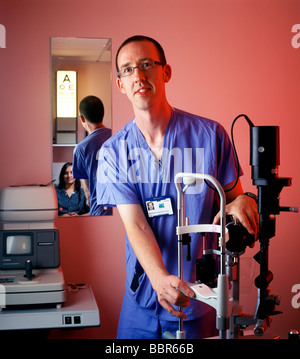 Optician with equipment for an eye test Stock Photo