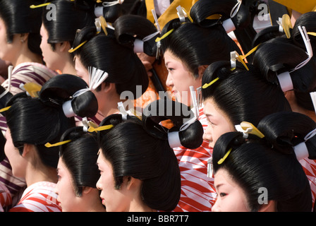 A group of women dressed in festival costume and wearing a traditional wigs during the Himesama Dochu event in Kiga, Hosoe Stock Photo