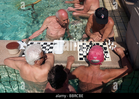 CHESS PLAYERS IN A POOL AT THE SZECHENYI BATHS, HUNGARIAN TRADITION, OUTDOOR POOL, SZECHENYI BATHS, BUDAPEST, CAPITAL, HUNGARY Stock Photo