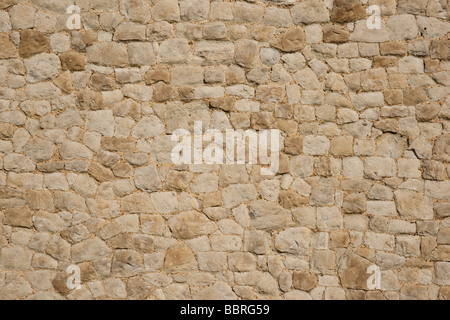Old stone wall suitable as background with patterns and texture Stock Photo