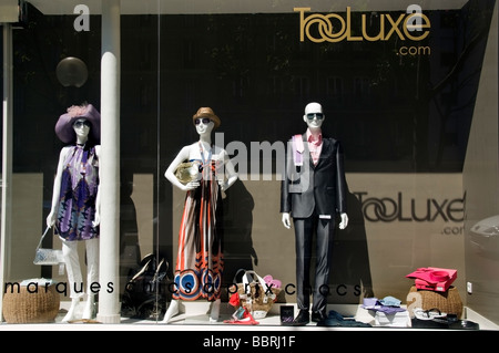 Paris France, Luxury Clothes, Shopping, French Shop Front Window Display, Outside 'Too Luxe' mannequins fashion clothes, womens hats, fast fashion Stock Photo