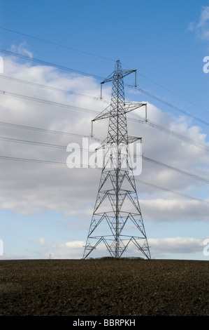 Electricity pylon and sky with clouds Stock Photo - Alamy