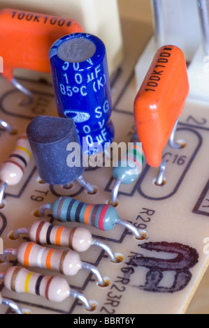 Electronic circuit board with several components including resistors and capacitors Stock Photo