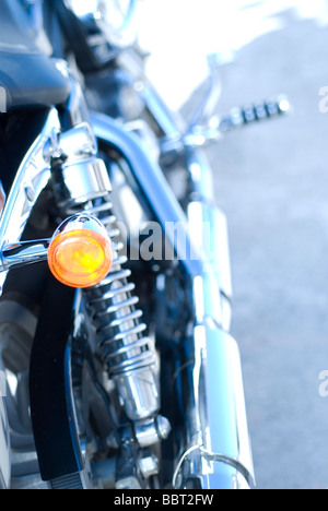 Details of Harley Davidson motorcycle. Blue background Stock Photo
