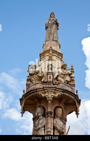 The image of Queen Vicoria, dressed in a sumptious gown, tops the The Doulton Fountain, which currently stands in Glasgow Green. Stock Photo