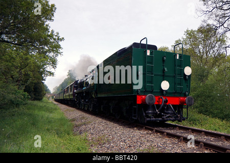 Rebuilt Bulleid Light Pacific No. 34059 steam locomotive near Kingscote Station Stock Photo