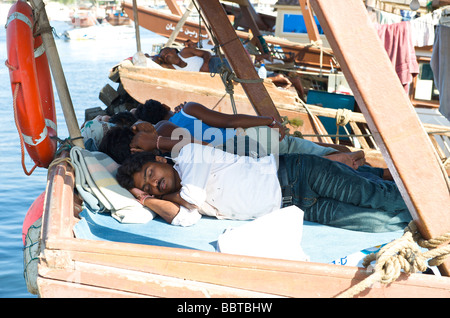 Dubai local fishermen sleeping on their ship Stock Photo