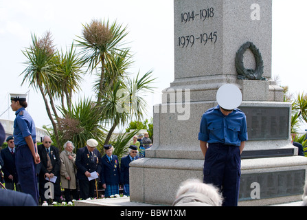 Sea Scouts bow their heads at a D-Day 65th Commemoration service in Clacton, Essex, UK. Stock Photo