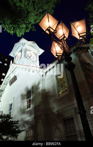 Sapporo clock tower with street light in night at Hokkaido, Japan Stock Photo