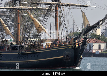 HMS Bounty navigates out to sea after the Festival of Sail held in San Pedro, Los Angeles Harbor, California Stock Photo