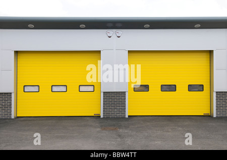 two yellow industrial unit doors Stock Photo