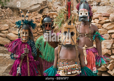 Africa West Africa Mali Dogon Country Bandiagara escarpment Masked Ceremonial Dogon Dancers near Sangha Stock Photo