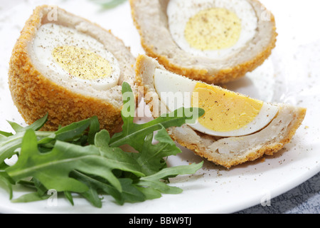 Fresh Tasty Scotch Eggs with Rocket Leaves And No People Stock Photo
