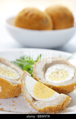 Fresh Tasty Scotch Eggs with Rocket Leaves And No People Stock Photo