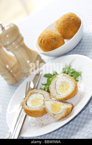 Fresh Tasty Scotch Eggs with Rocket Leaves And No People Stock Photo