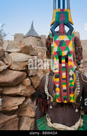 Africa West Africa Mali Dogon Country Bandiagara escarpment Masked Ceremonial Dogon Dancer near Sangha Stock Photo