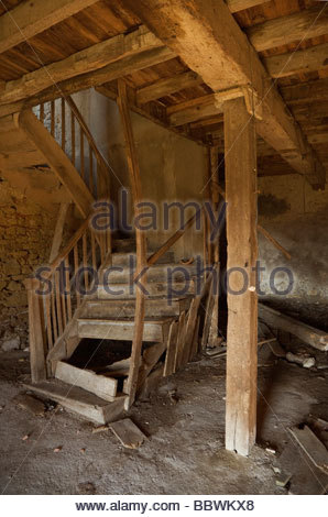 dilapidated wooden staircase in ruined house Stock Photo, Royalty Free ...