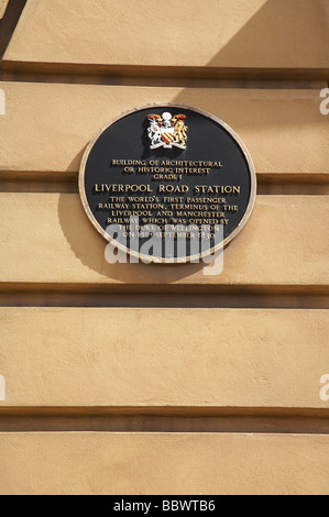 Plaque outside former Liverpool Road railway station in Manchester UK Stock Photo