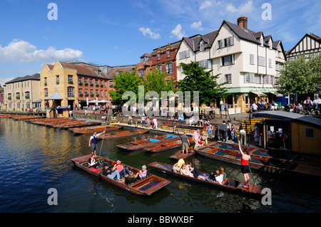Punting on the River Cam at the Quayside and Magdalene Bridge area  of Cambridge England UK