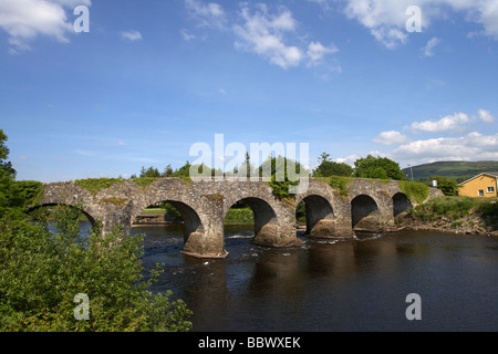 old arched stone bridge over the river strule in newtownstewart county tyrone northern ireland Stock Photo