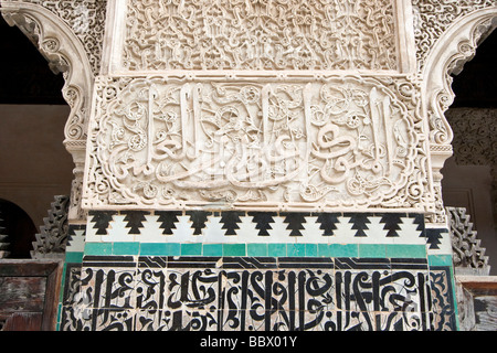 Ornate Arabic Inscription on the Bou Inania Medersa in Fez Morocco Stock Photo