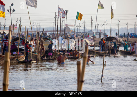 Hindu People Bathing in the Ganga River Confluence in Allahbad India Stock Photo