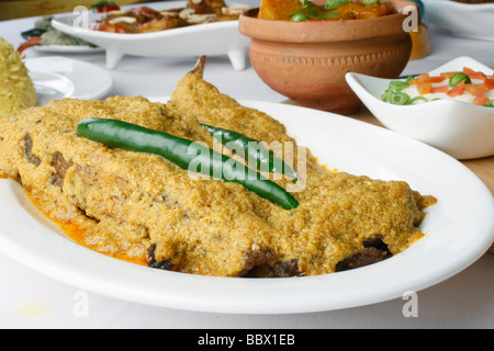 Doi ilish Hilsa or Ilish Mach is a popular fish dish from eastern part of India. Stock Photo