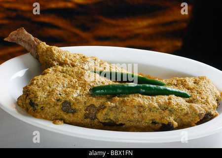 Doi ilish Hilsa or Ilish Mach is a popular fish dish from eastern part of India. Stock Photo