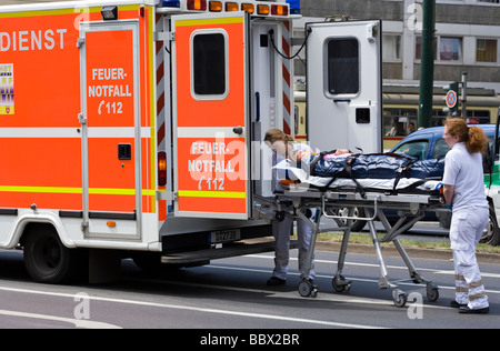 Accident victim on stretcher Stock Photo - Alamy