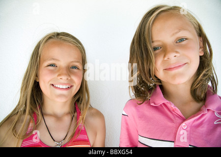 Portrait of two smiling children Sweden. Stock Photo